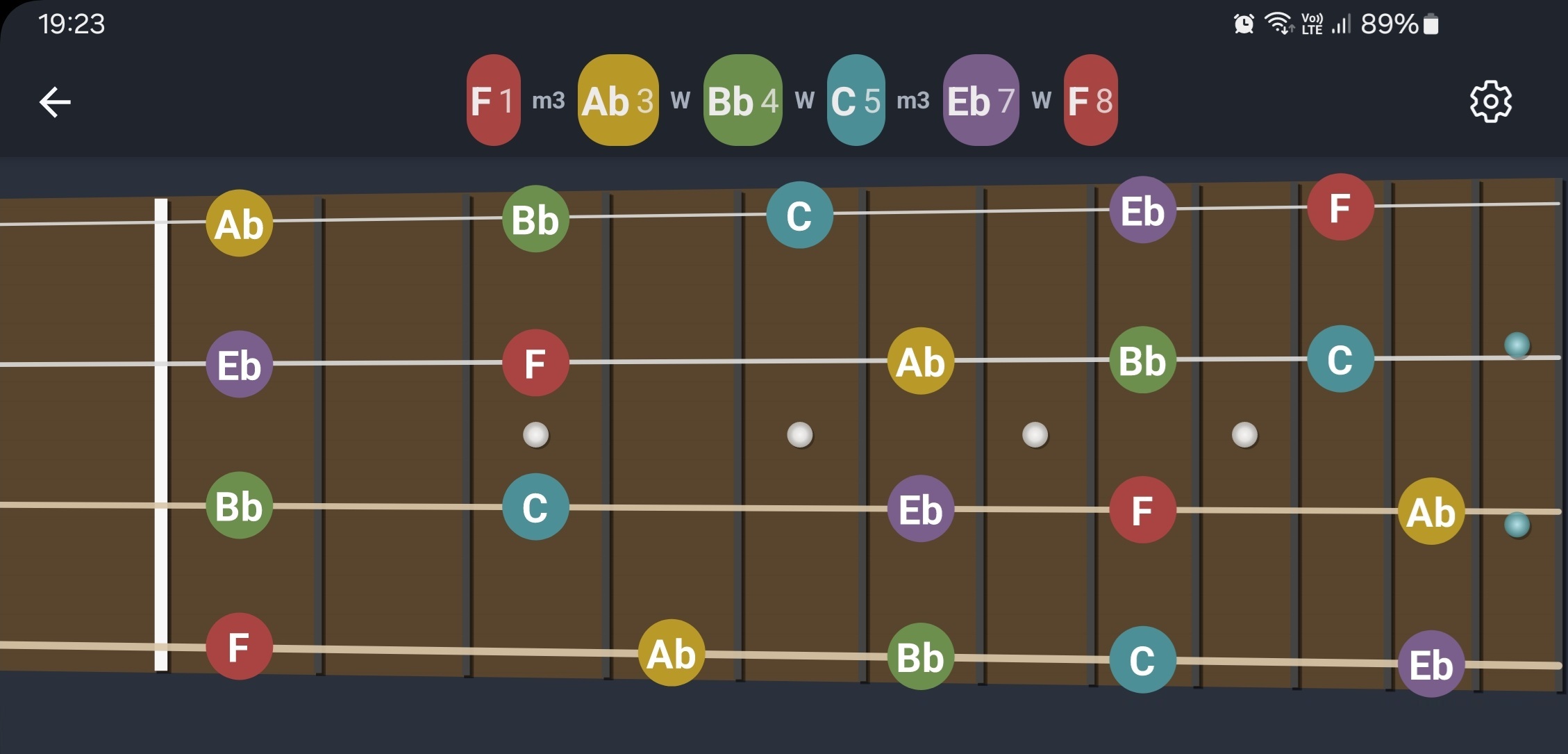 FretGenius app on landscape smartphone showing a customized light theme fretboard